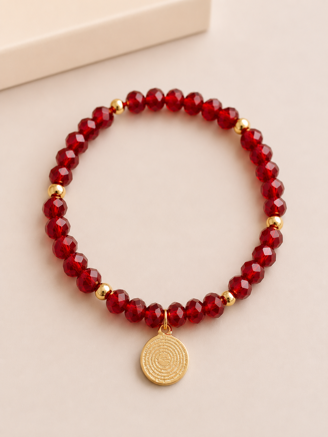 Pulsera Cristal Rojo con Padre Nuestro
